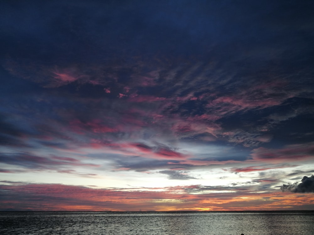 Beautiful Beach Sunset Under Blue Cloudy Sky Wallpapers