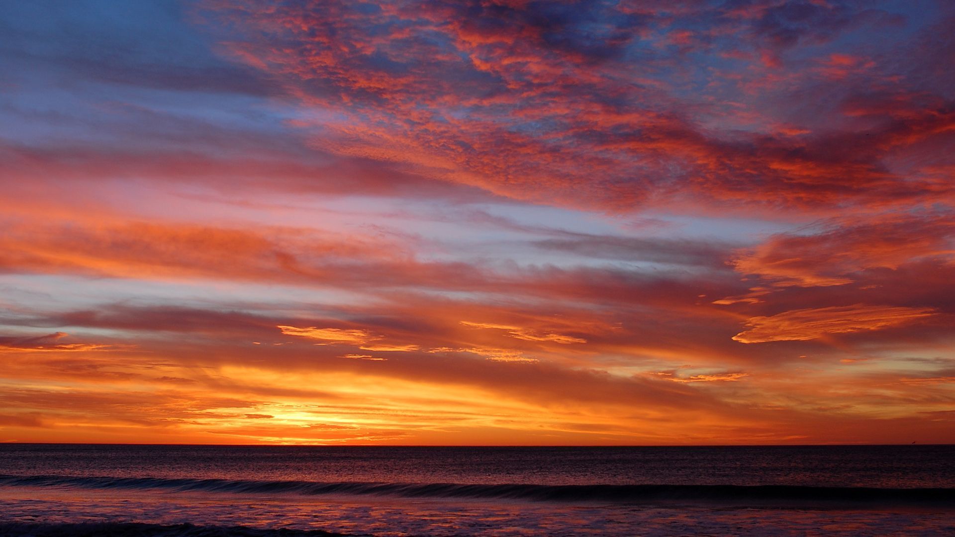 Beautiful Beach Sunset Under Blue Cloudy Sky Wallpapers