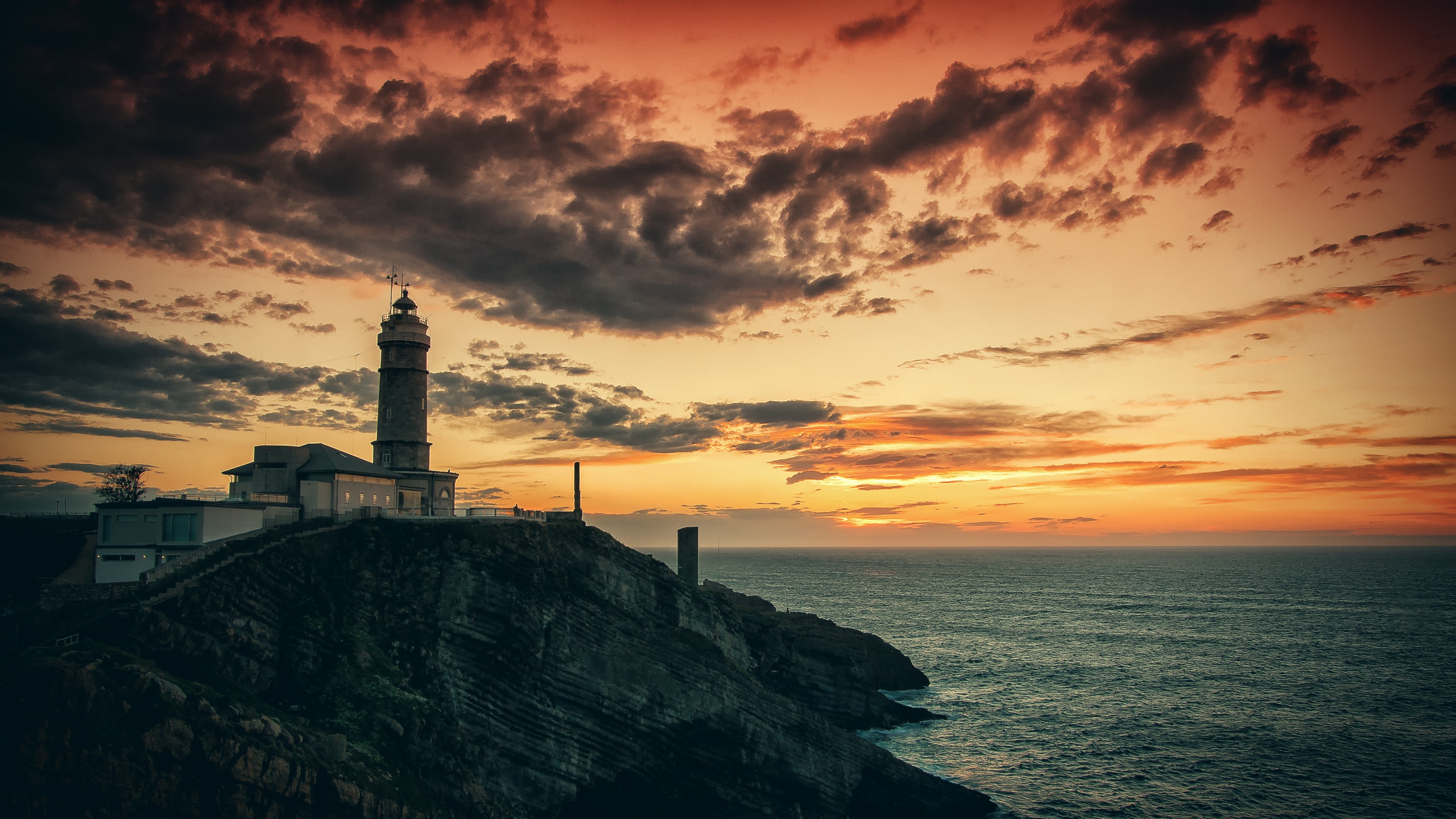 Yellow Sunset Near Lighthouse Wallpapers