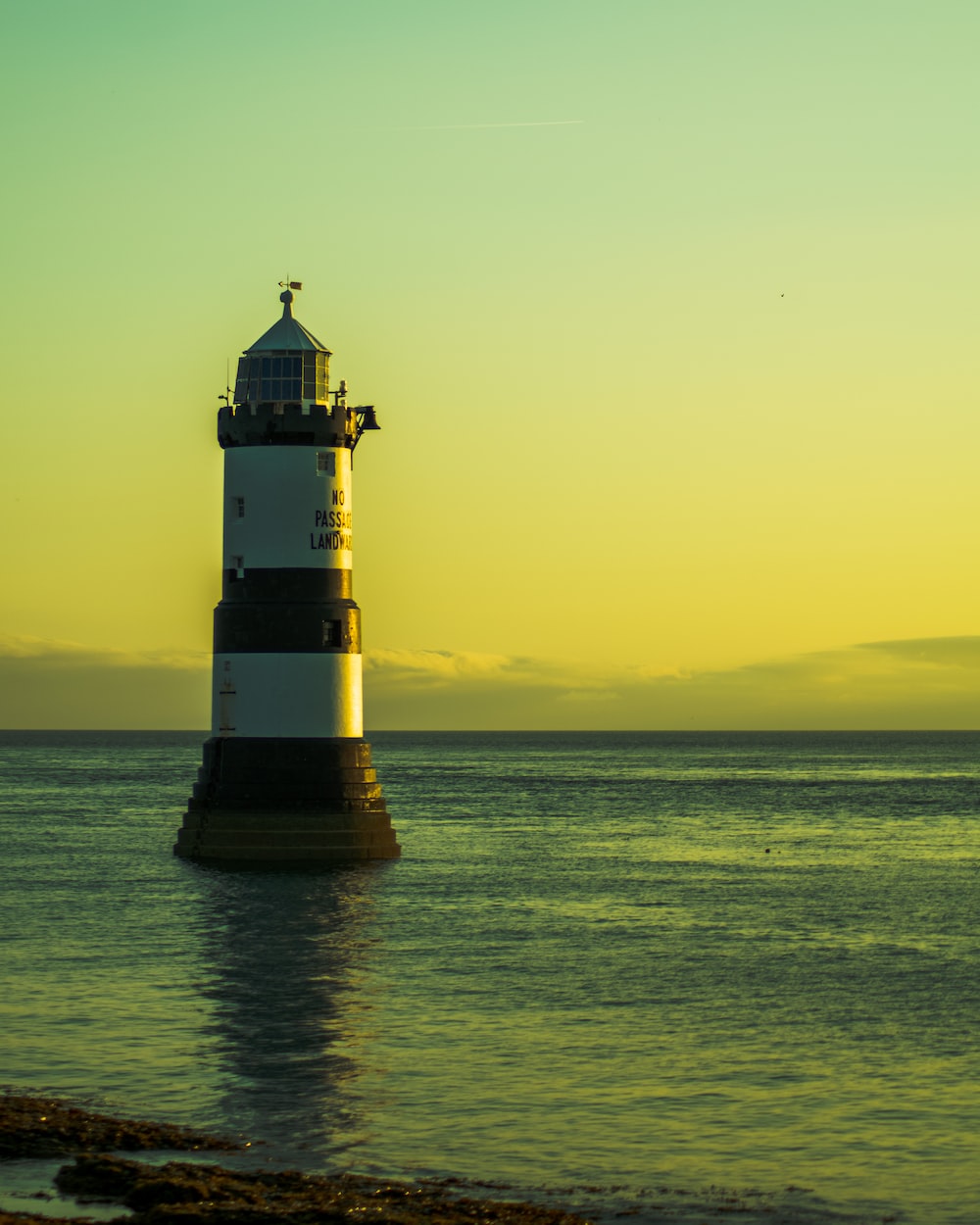 Yellow Sunset Near Lighthouse Wallpapers