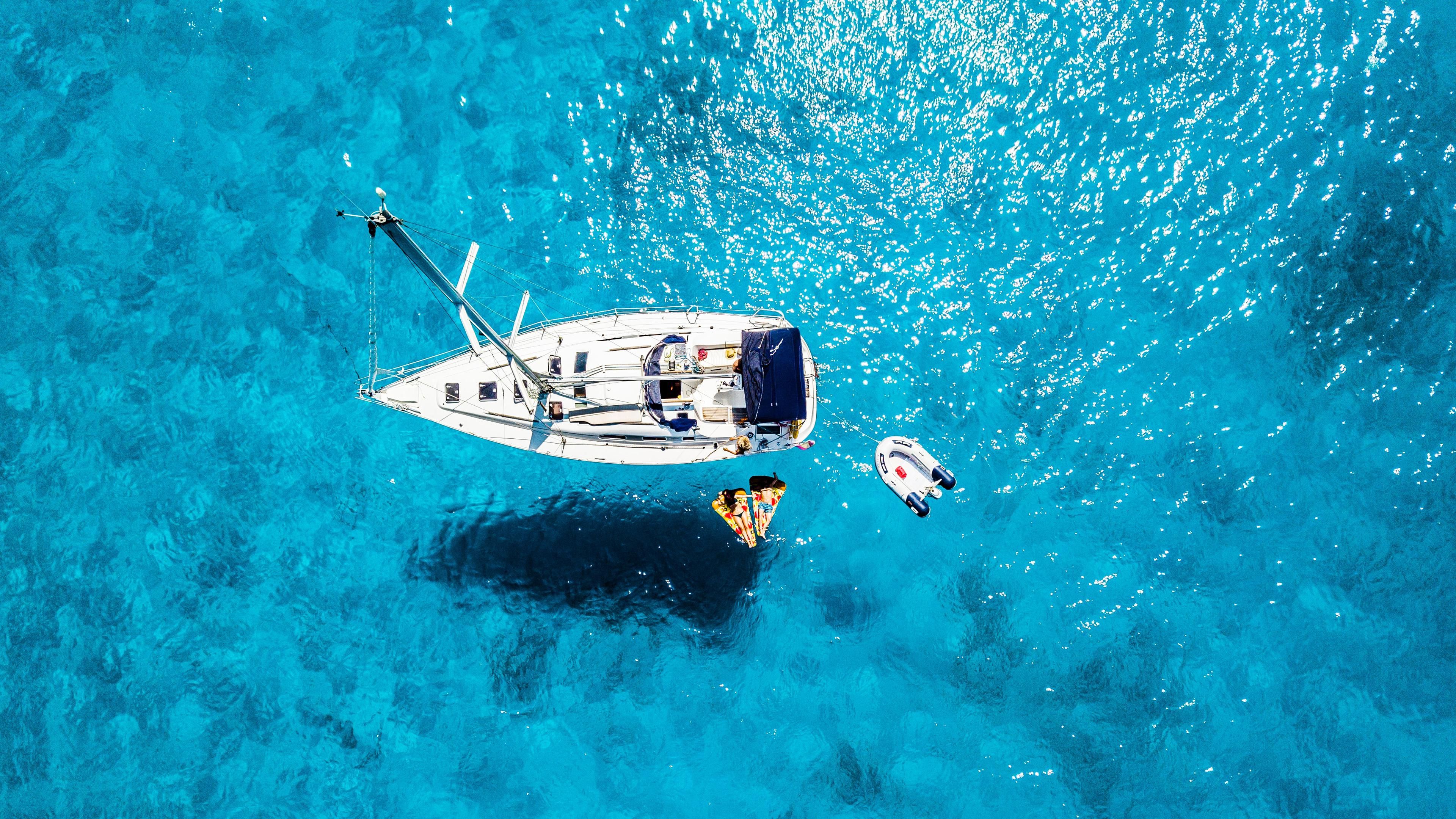 Boat In Blue Sea Water Wallpapers