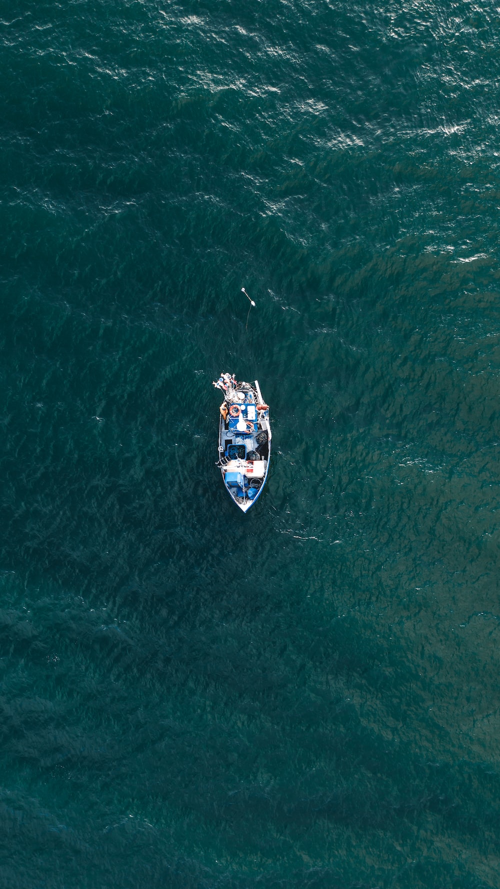 Boat In Blue Sea Water Wallpapers