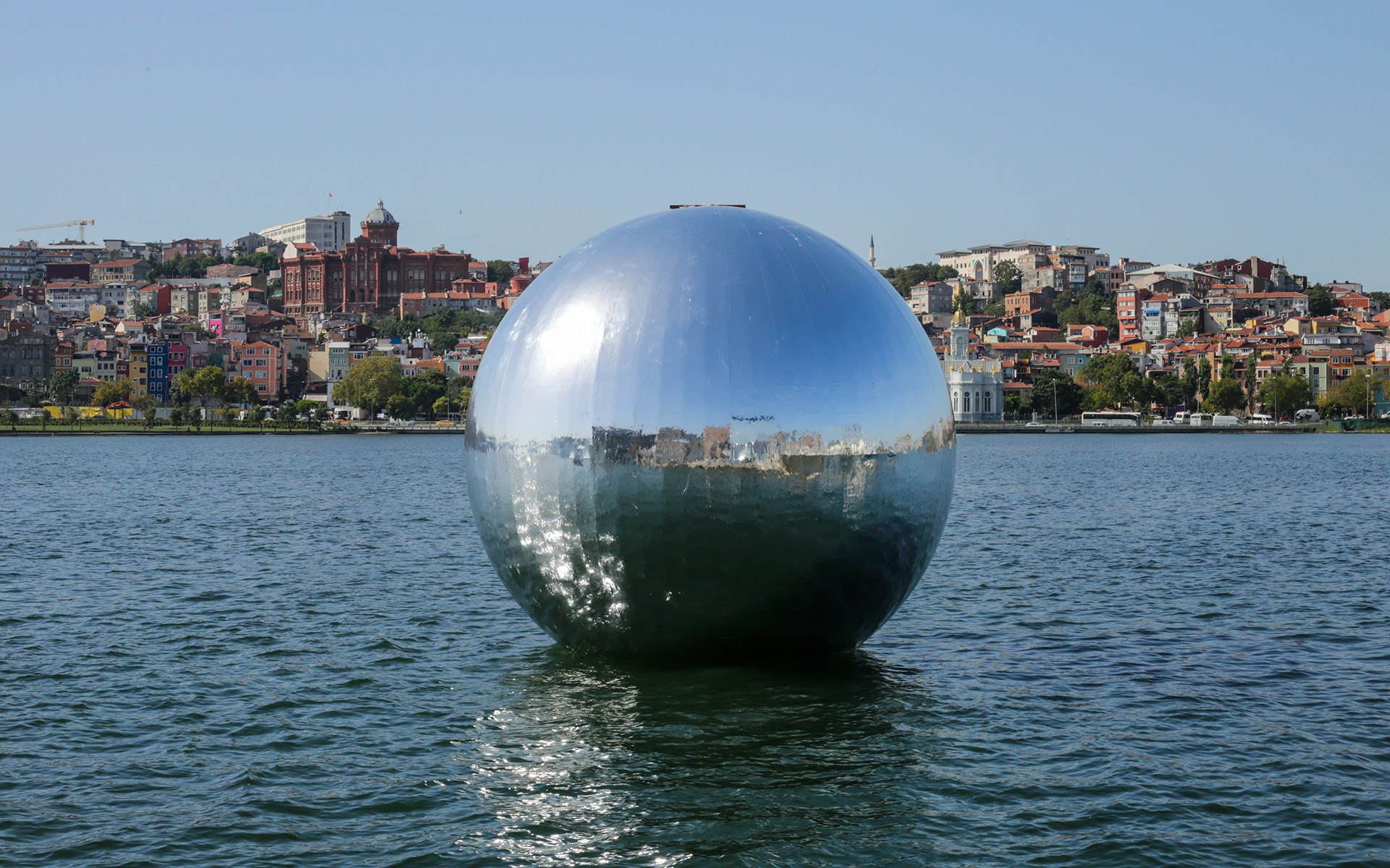 Man In Lake With Sphere Artistic Wallpapers