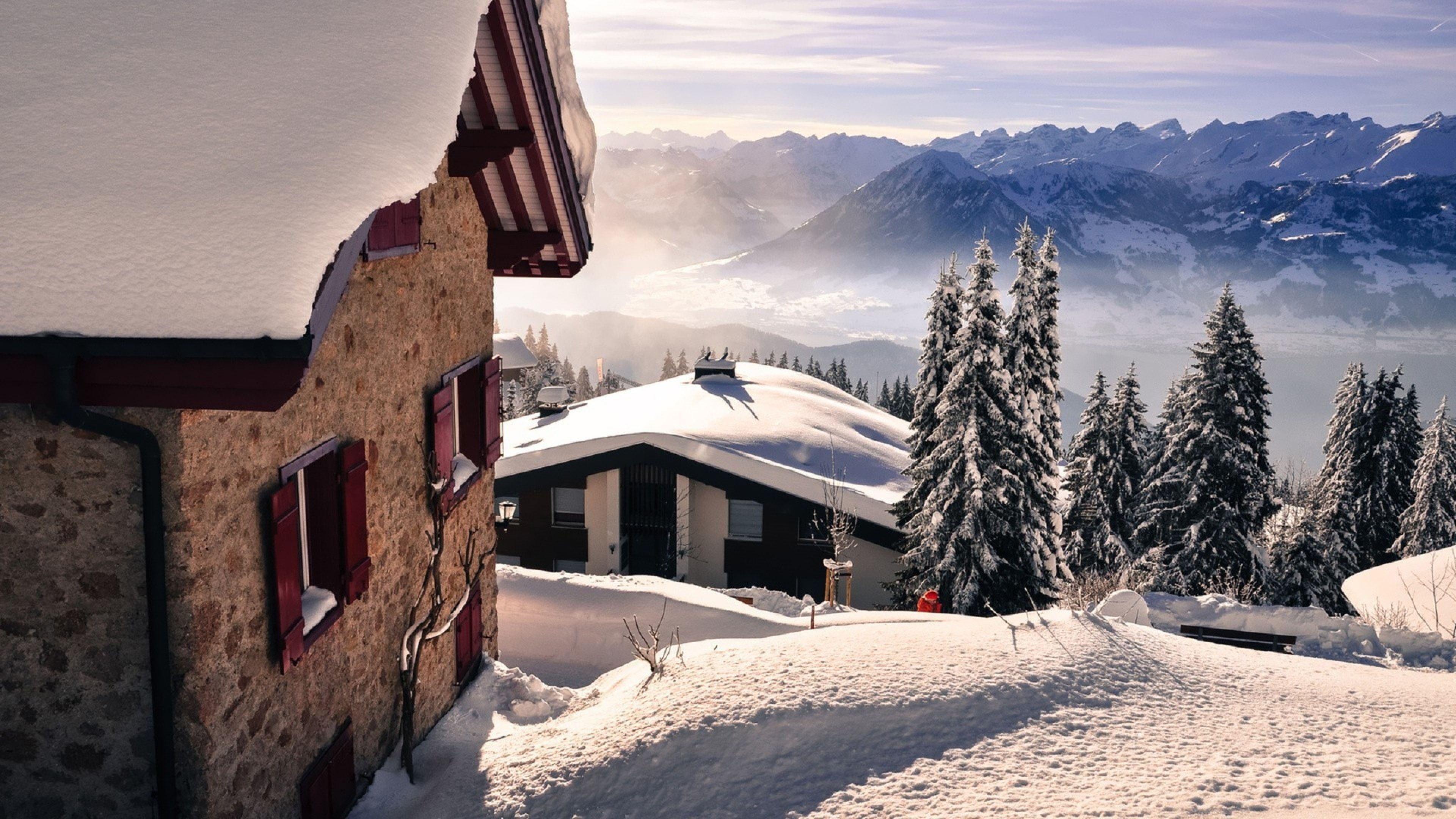 Snowy House In Mountains 4K Wallpapers