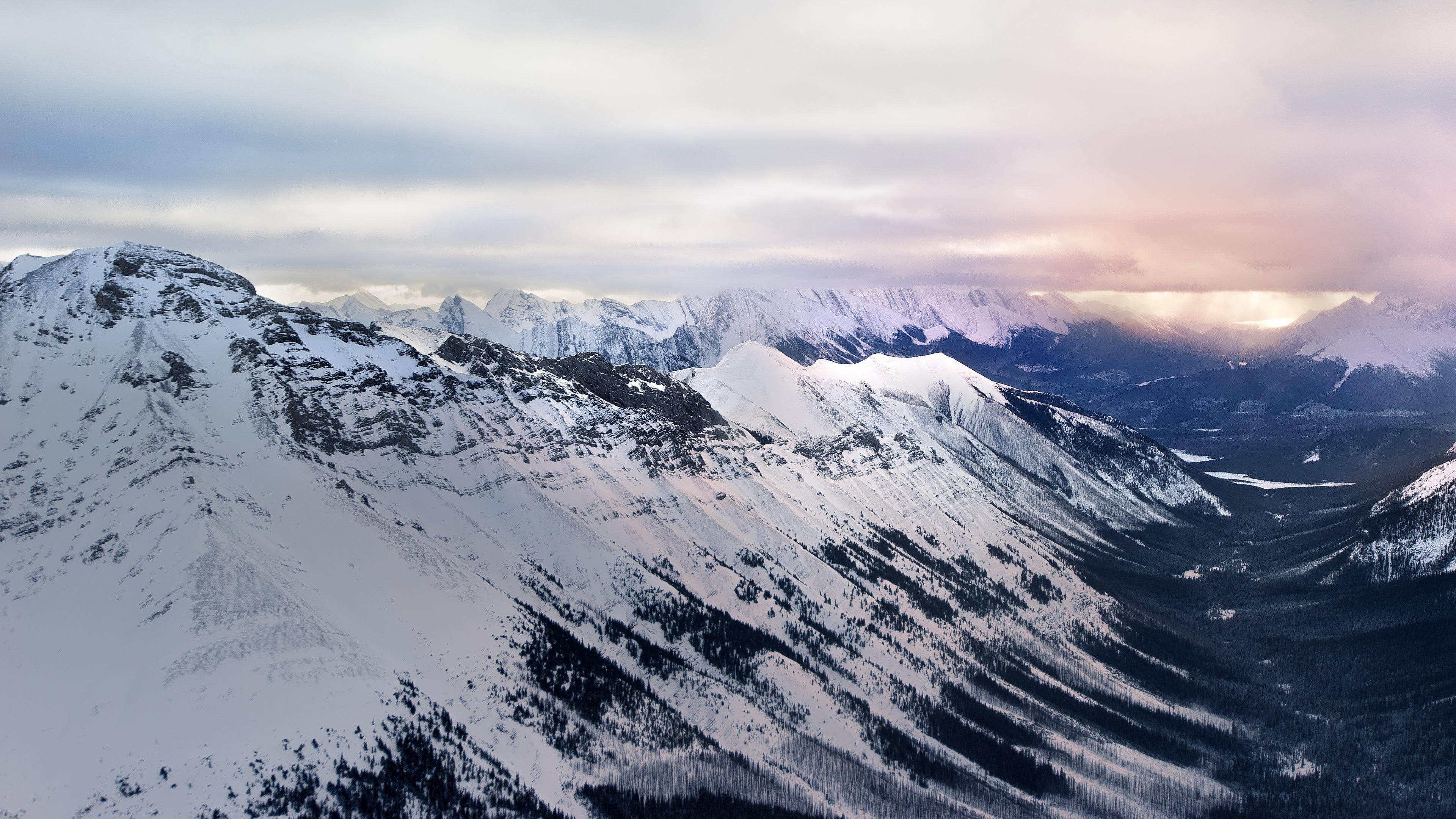 Snowy House In Mountains 4K Wallpapers