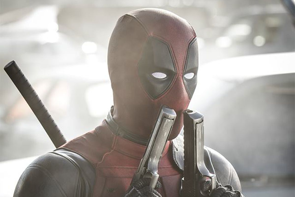 Deadpool With Guns Up Wallpapers