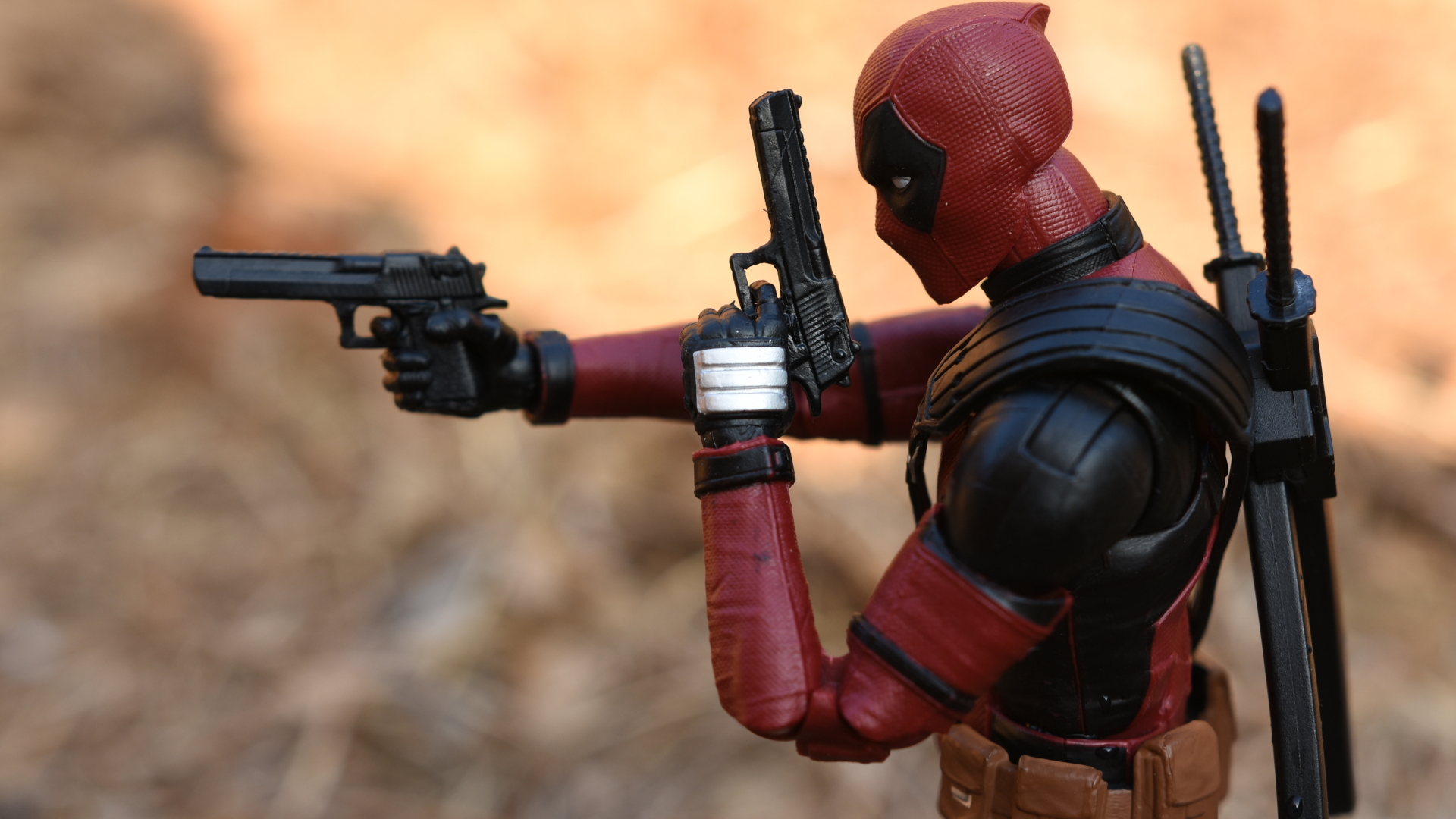 Deadpool With Guns Up Wallpapers