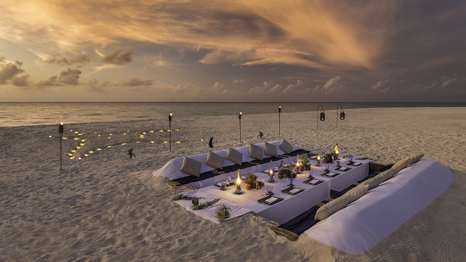 Dining On The Beach At Night In The Maldives Ocean Wallpapers
