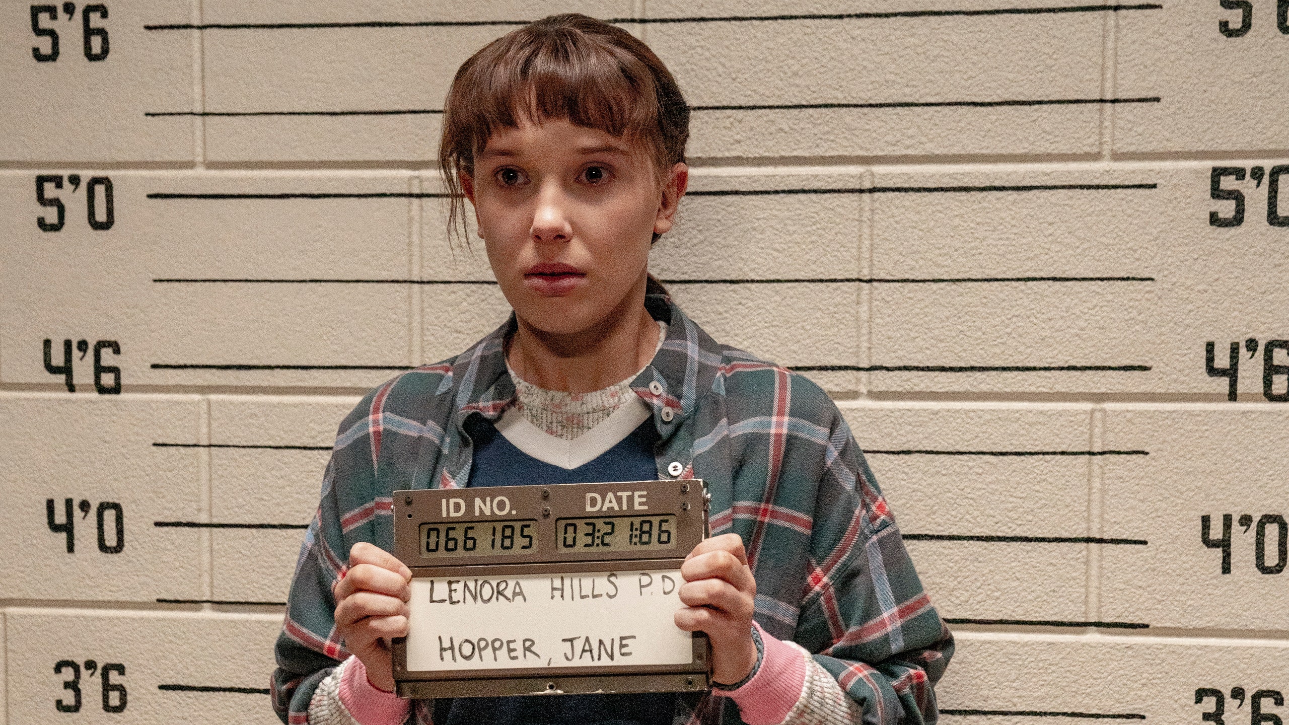 Millie Bobby Brown As Eleven In Stranger Things Logo Wallpapers