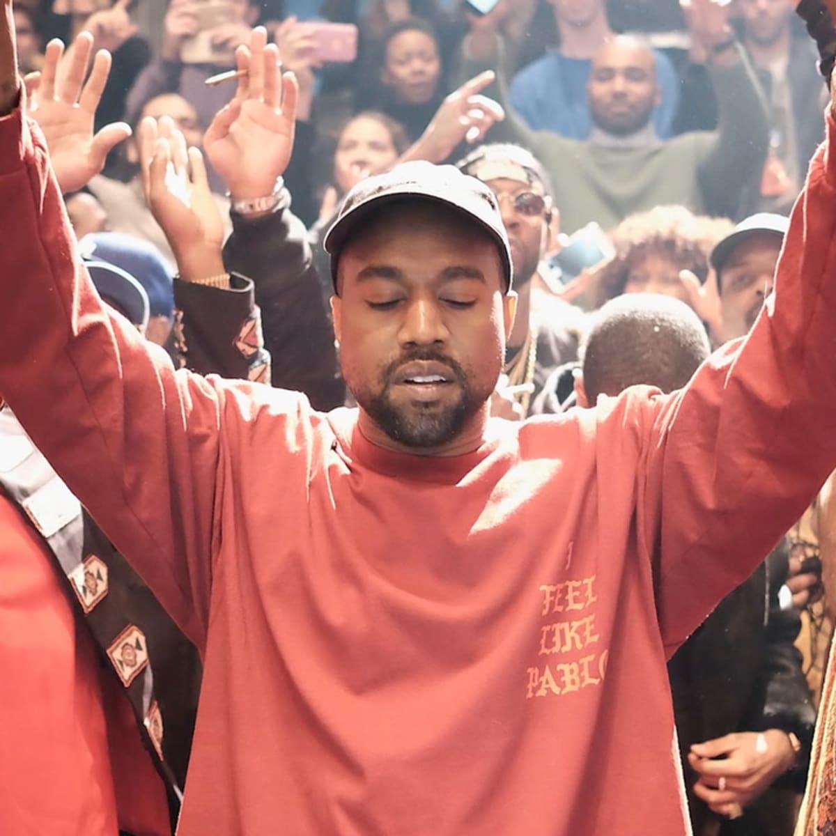 Kanye West With His Hands Up Wallpapers