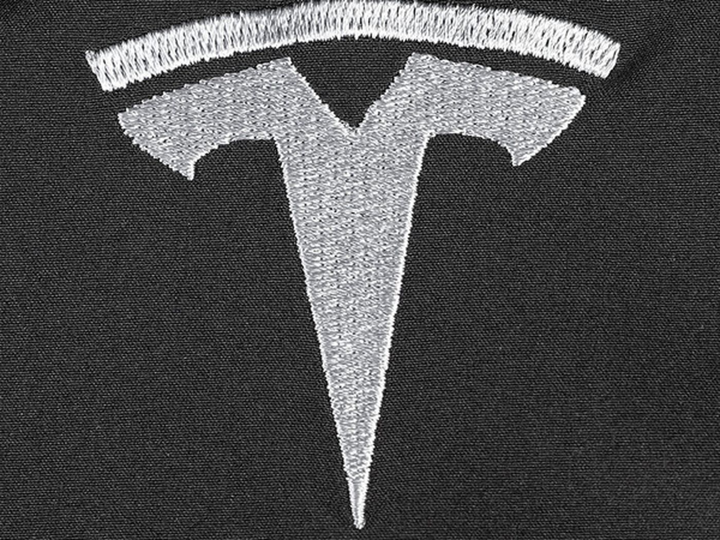 Tesla Logo Black Background